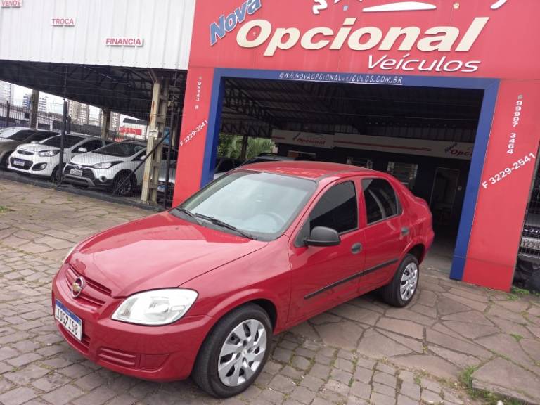 CHEVROLET - PRISMA - 2007/2008 - Vermelha - R$ 23.500,00