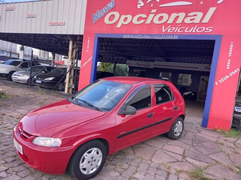 CHEVROLET - CELTA - 2003/2004 - Vermelha - R$ 21.900,00